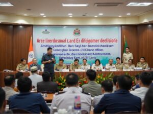 Conrad K Sangma – Separate IAS Cadre for Meghalaya Soon Meghalaya Chief Minister Conrad K Sangma addressing a formal conference of Meghalaya Civil Service officers in Shillong. The setting shows a government auditorium with officers seated attentively, banners displaying the event title, and the CM speaking at a podium with the Meghalaya state emblem in the background. The atmosphere is professional and dignified, with soft lighting and a focus on administrative reform and governance