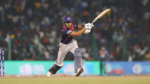 Shubman Gill Leads Gujarat Titans to Victory over Kolkata shubman-gill-in-action-a-wide-angle-shot-of-shubma