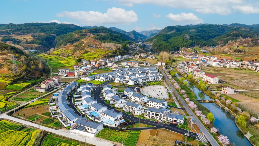 China Poverty Alleviation: How China Lifted 800 Million People Out of Poverty 1 A paved asphalt road leads to households in a reservoir resettlement village in Shiyan City, central China's Hubei Province, March 8, 2026. /VCG